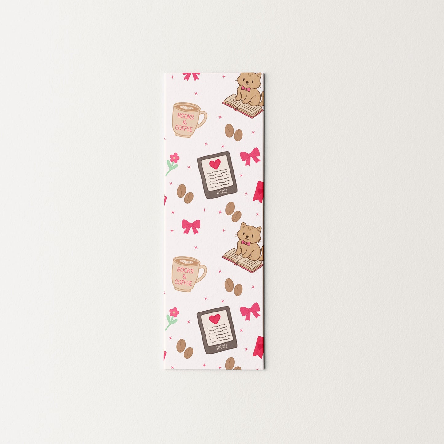 Decorative bookmark with cats and coffee cup designs on a white background