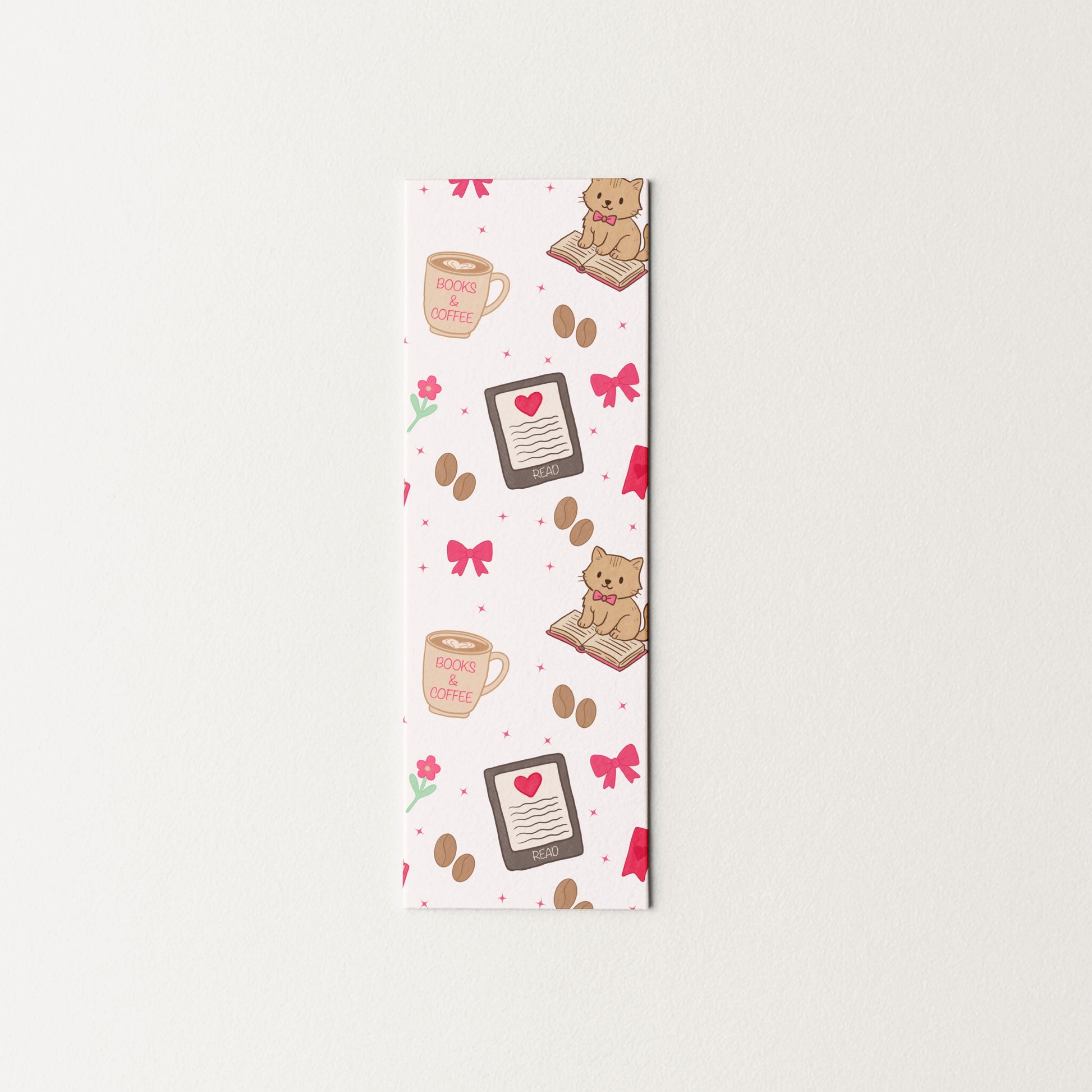 Decorative bookmark with cats and coffee cup designs on a white background