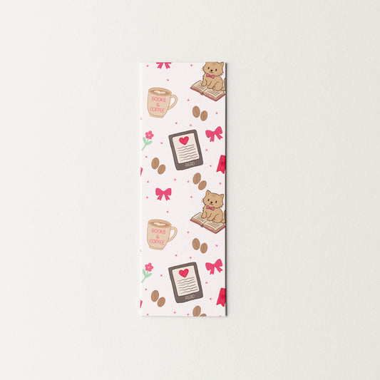 Decorative bookmark with cats and coffee cup designs on a white background