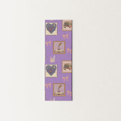 Purple bookmark with fantasy decorative designs on a white background