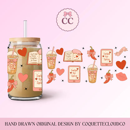 Single 16oz glass can featuring the Smut Reader wrap design with pink and red bookish doodles, hearts, and ribbons. Minimal soft background.