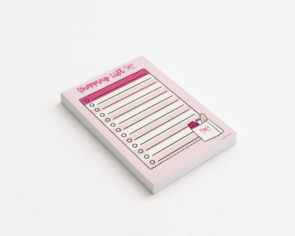 a5 shopping list notepad on white background