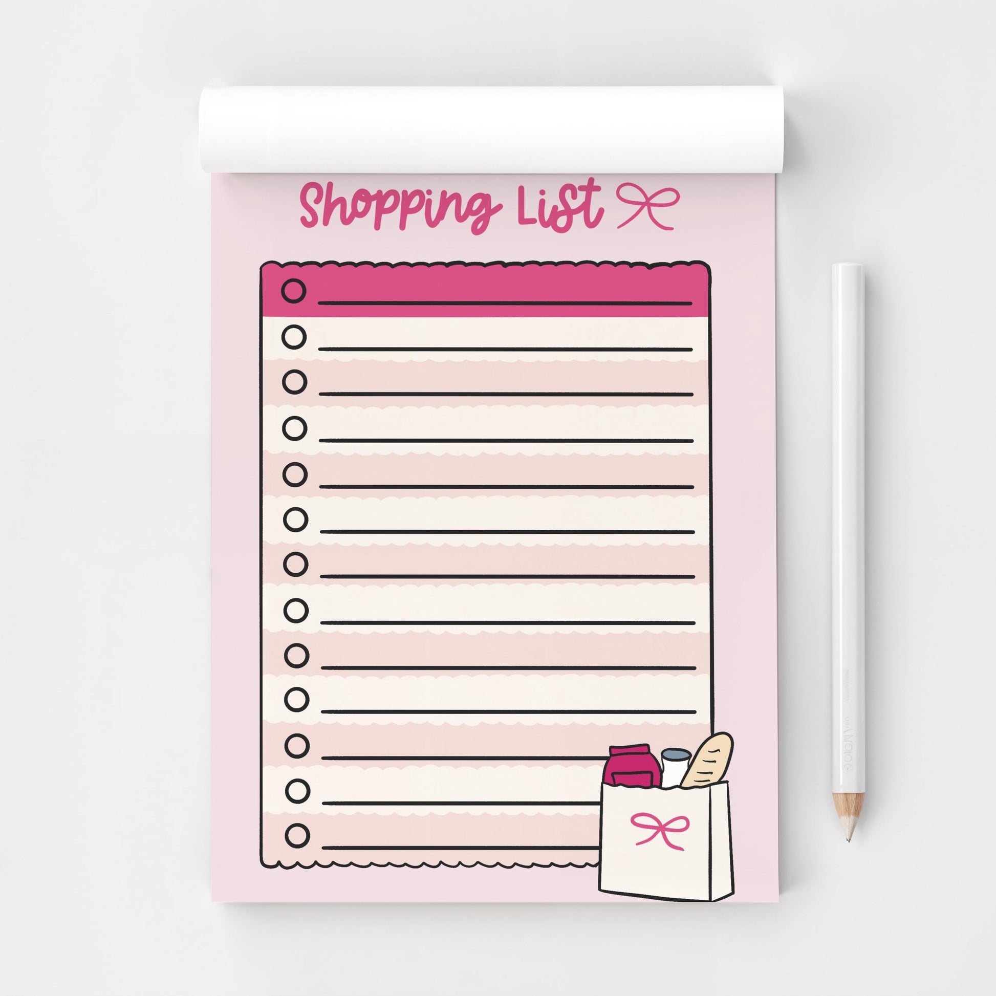 a5 pink shopping list on white background with white pencil