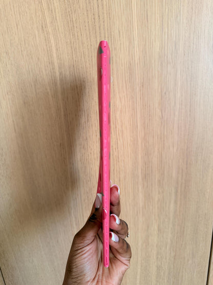 Side view of the cherry-themed notebook showing spine thickness and binding.